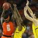 Michigan freshman Glenn Robinson III and freshman Mitch McGary guard Syracuse junior C.J. Fair during the second half at the Final Four in Atlanta on Saturday, April 6, 2013. Melanie Maxwell I AnnArbor.com